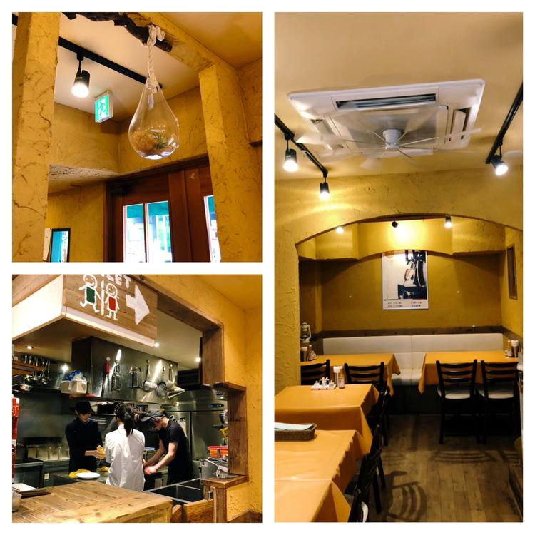 オレンジと木目が基調の店内