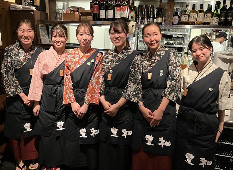 有名デザインの前掛けでお仕事