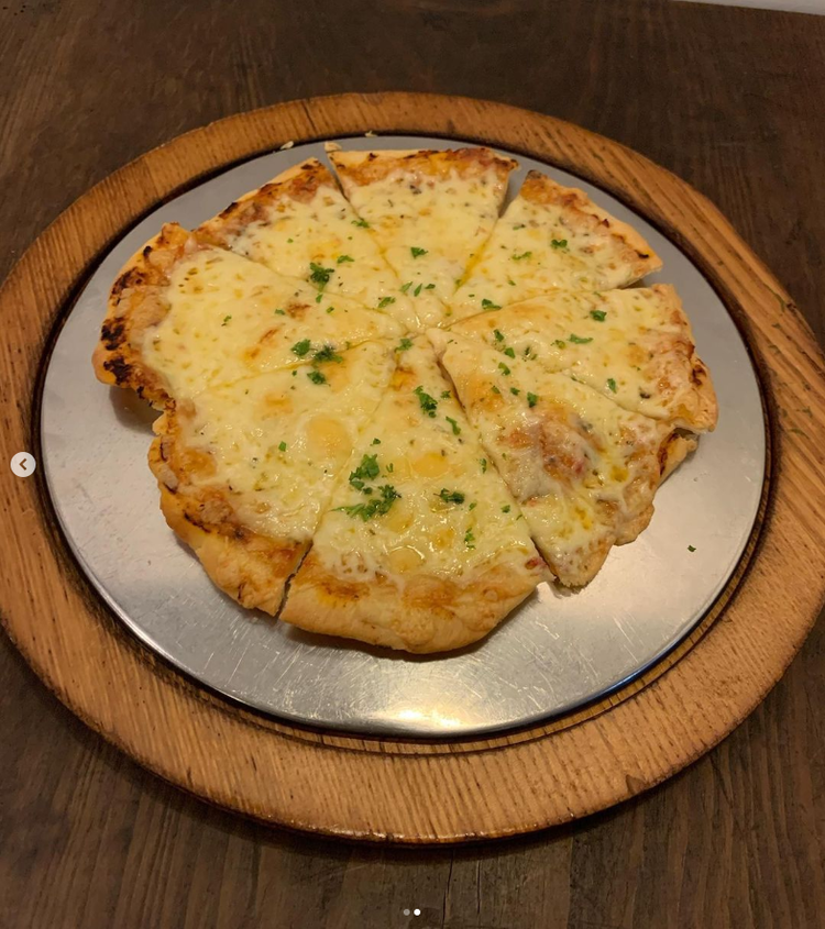自慢のキビヤピザ。