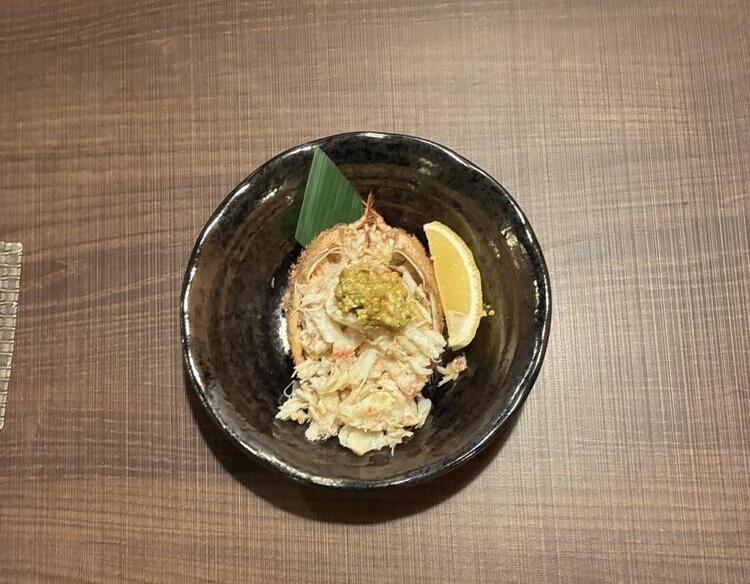 人気メニュー"毛蟹の甲羅詰め"